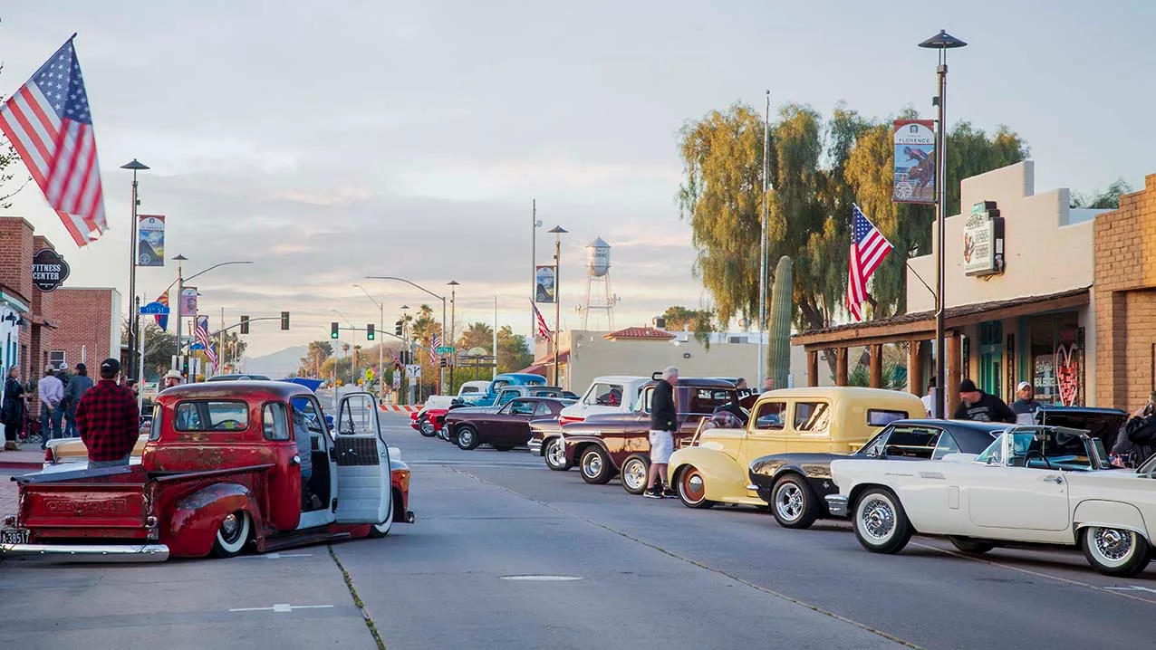 JC002 2023 Florence Car Show with water tower 2023 Florence Car Show with water tower, vehicles, a fine art photograph by Janell Evelyn Baca