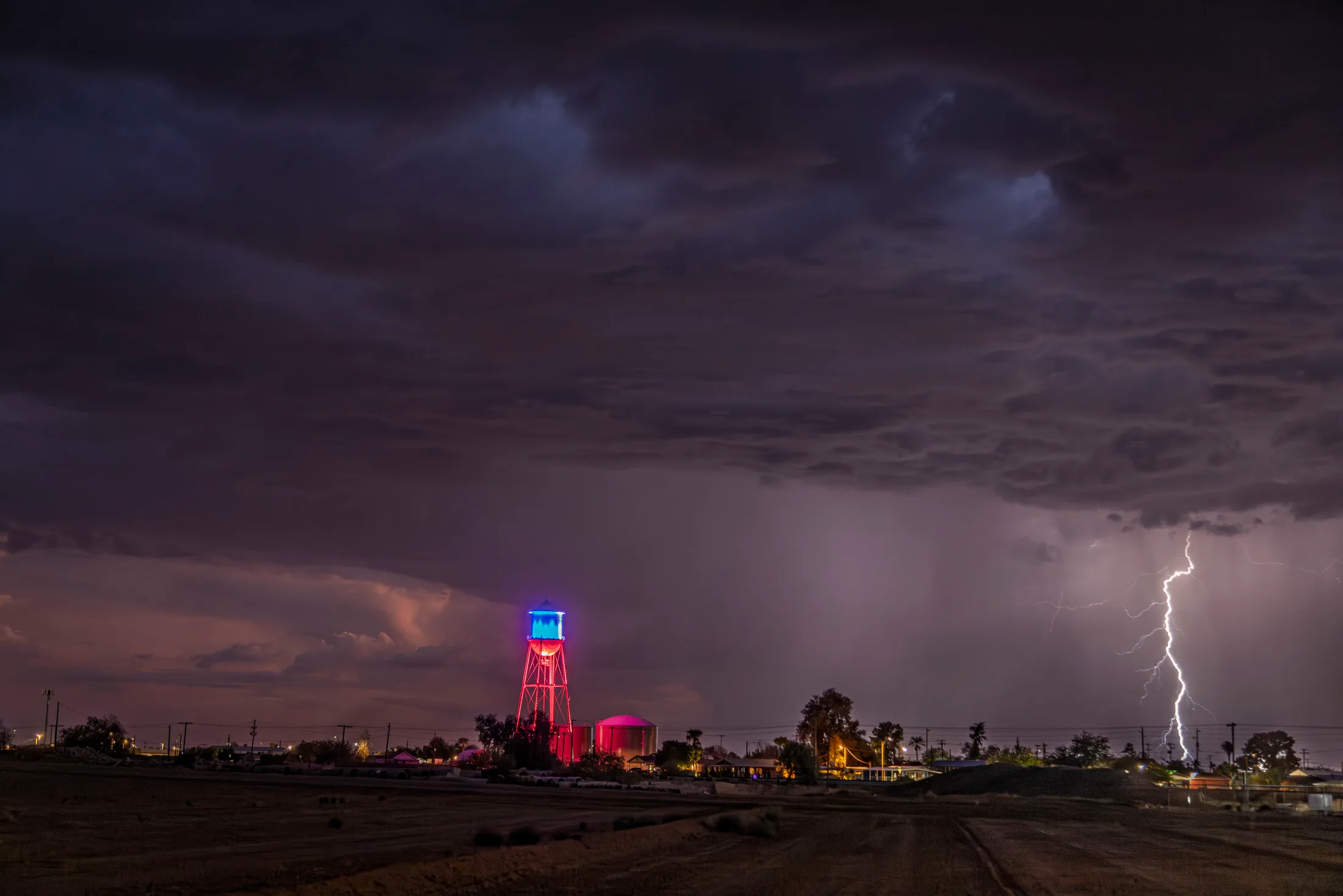 MST (48) Coolidge Water Tower and Lightning Coolidge Water Tower and Lightning, a fine art photograph by Michael Joseph Baca, Casa de Baca Studios, Florence, Arizona