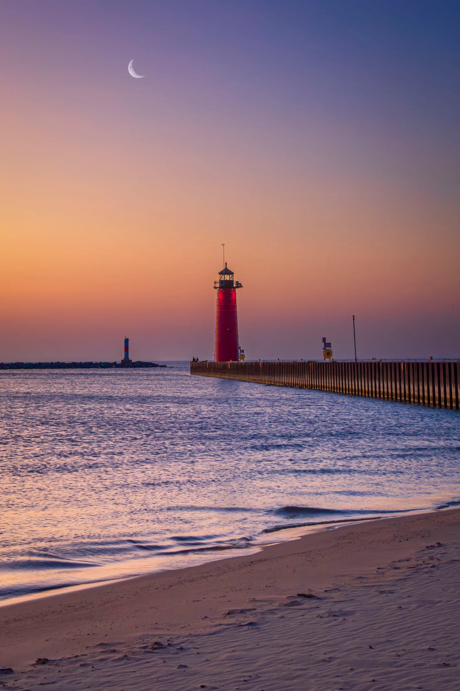 MMN (29) Kenosha Pier with Lighthouse and Moon Wisconsin Kenosha Pier with Lighthouse and Moon Wisconsin, a fine art photograph by Michael Joseph Baca