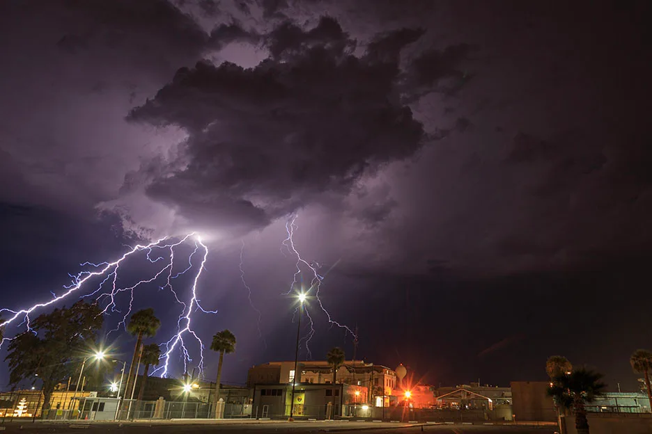 LJ033 Lightning at ASPC Buildings Florence AZ Lightning at ASPC Buildings Florence AZ, a fine art photograph by Janell Evelyn Baca, Casa de Baca Studios, Florence, Arizona