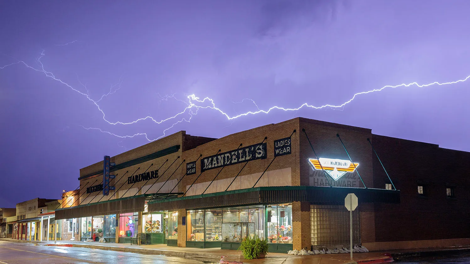 LJ054 Monsoon on Main Florence AZ Monsoon on Main Florence AZ, lightning, a fine art photograph by Janell Evelyn Baca, Casa de Baca Studios, Florence, Arizona