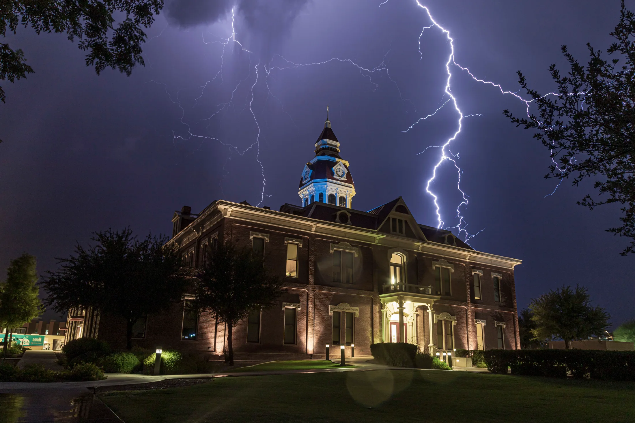 MST (26) Pinal County Courthouse Florence AZ Pinal County Courthouse Florence AZ, lightning, a fine art photograph by Michael Joseph Baca