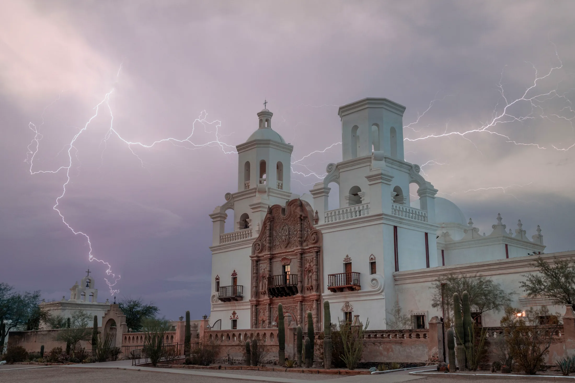 MST (53) San Xavier del Bac Mission Lightning Tucson AZ San Xavier del Bac Mission Lightning Tucson AZ, a fine art photograph by Michael Joseph Baca