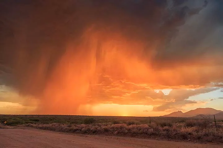 JS026 Stormy Sunset near Fort Bowie Willcox AZ Stormy Sunset near Fort Bowie Willcox AZ, a fine art photograph by Janell Evelyn Baca